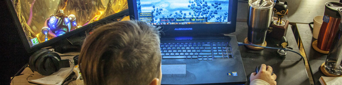 Child playing HEWMEN-enabled games